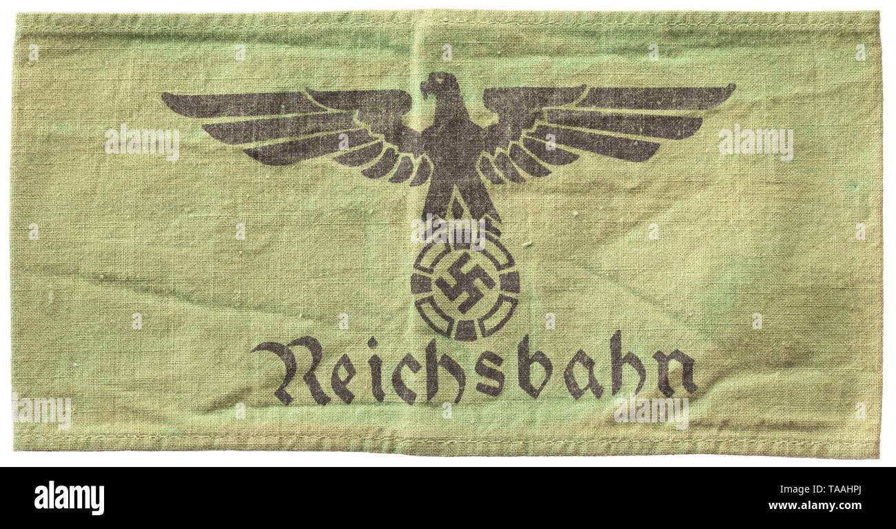 An armband 'Reichsbahn' (tr. 'Reich Railway Service') für Bahnschutz (tr. Railway Protection) or Bahnpolizei (tr. Station Police) Grüne Armbinde mit aufgedrucktem schwarzen, nach links blickenden Hoheitsadler und gothischer Aufschrift, innen Abnahmestempel. historic, historical, State, state-controled, state-run, organisations, organizations, organization, organisation, object, objects, stills, clipping, clippings, cut out, cut-out, cut-outs, utensil, piece of equipment, utensils, 20th century, Additional-Rights-Clearance-Info-Not-Available Stock Photo