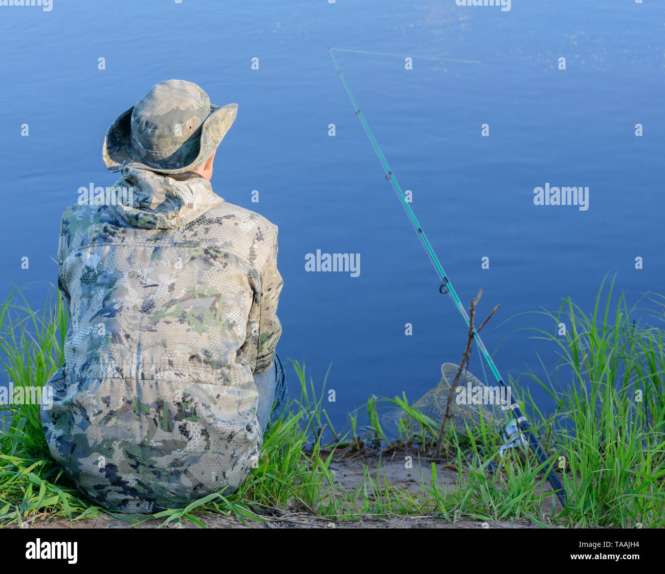 Fishing rod and basket hi-res stock photography and images - Alamy