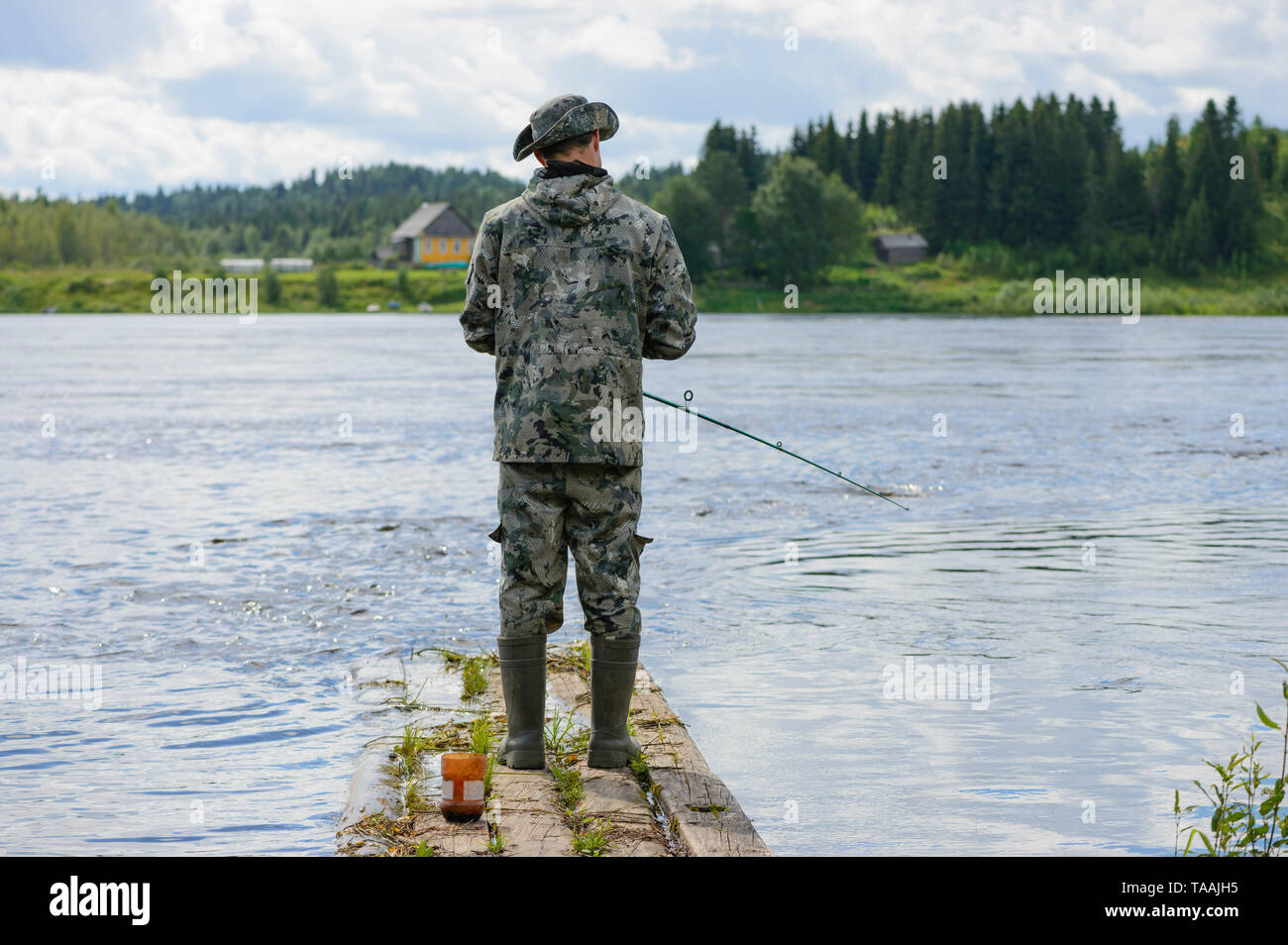 Fisherman with boots hi-res stock photography and images - Alamy