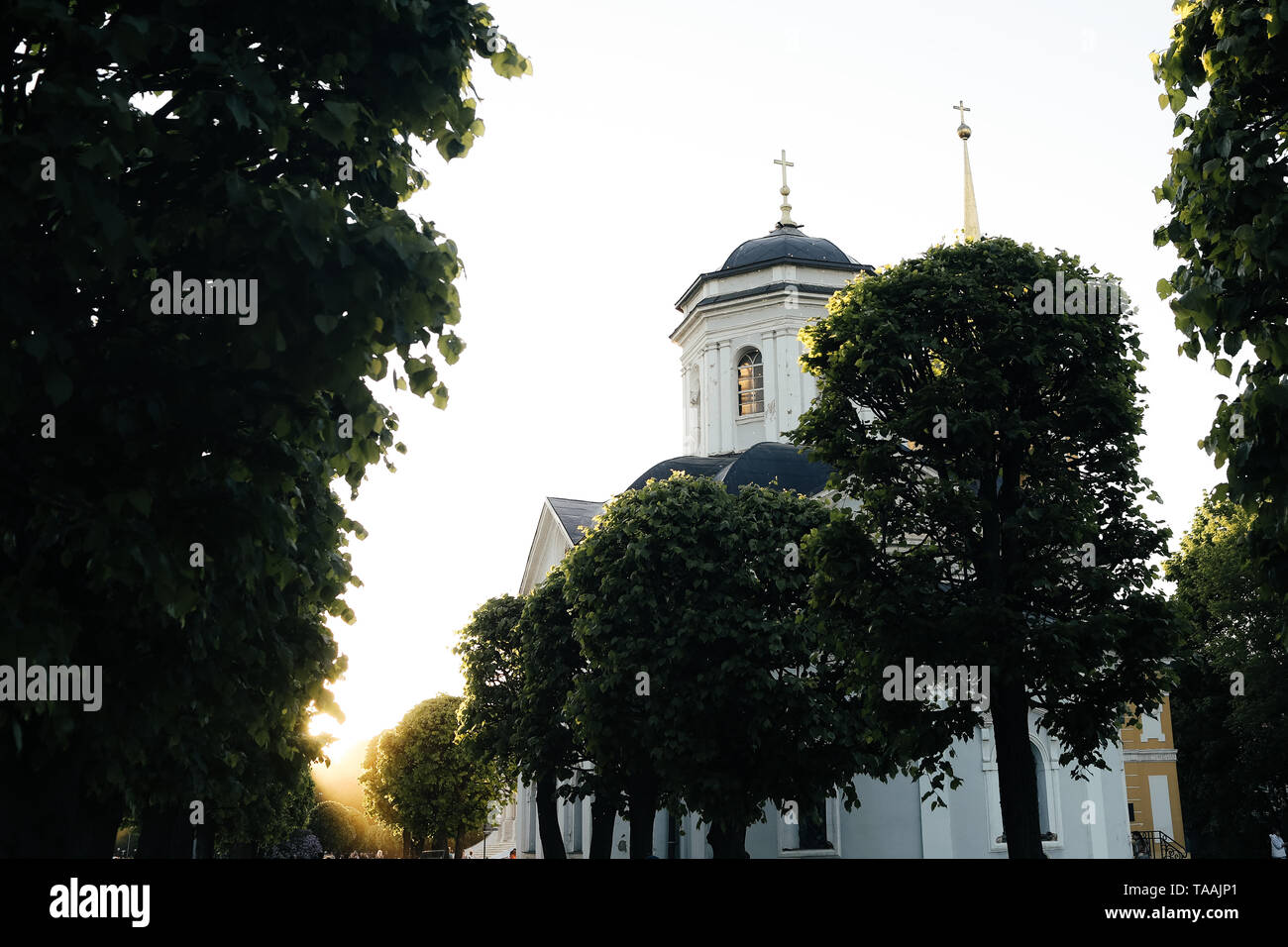 Small russian church in park at sunset Stock Photo