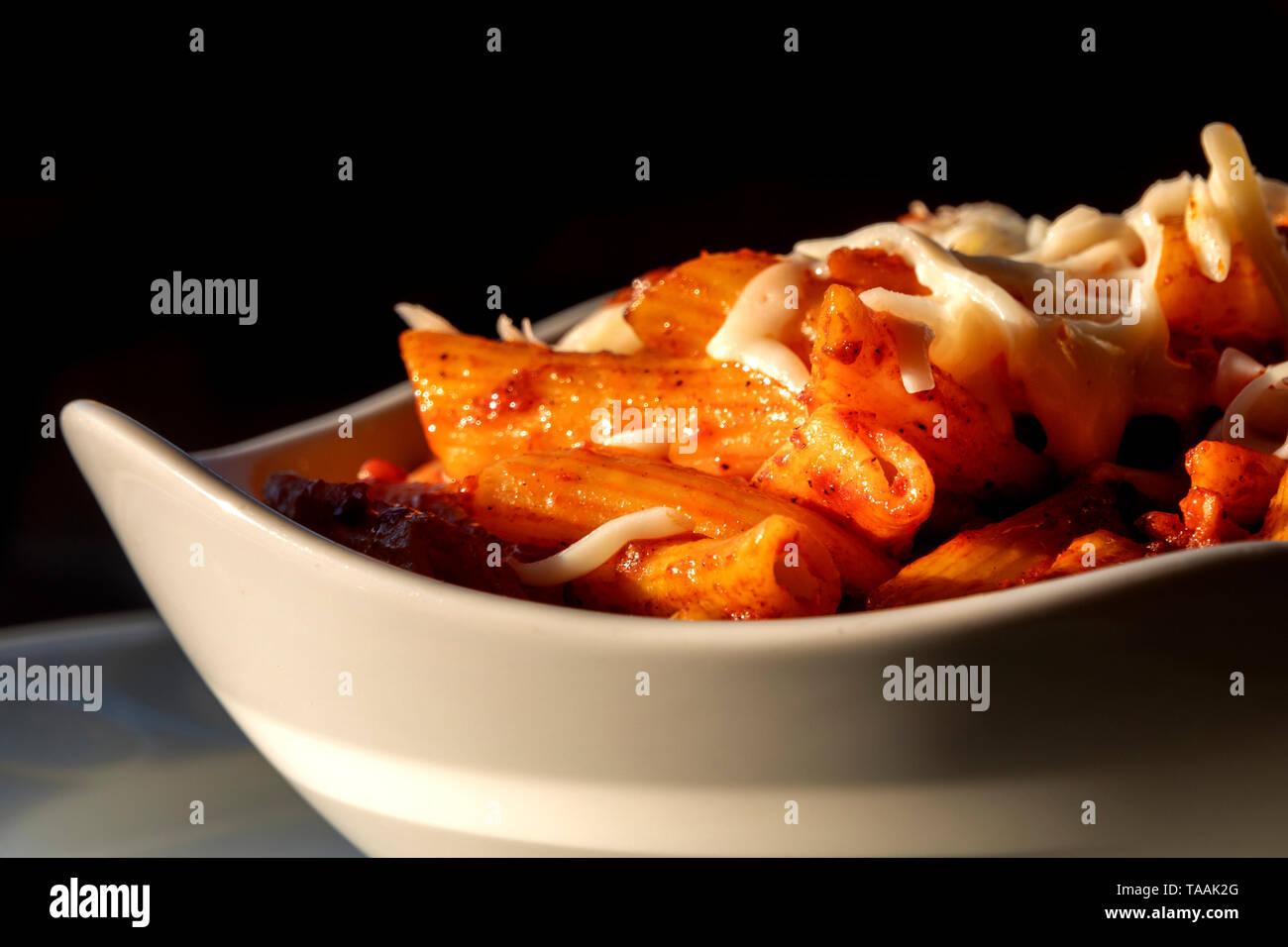 Pasta with tomato sauce and cheese Stock Photo