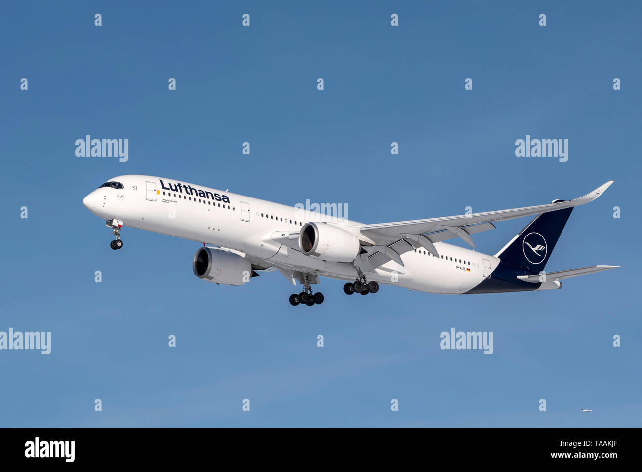 Munich, Germany - 08. February 2019 : Lufthansa Airbus A350-941 with the aircraft registration D-AIXL in the approach to the northern runway of the Mu Stock Photo