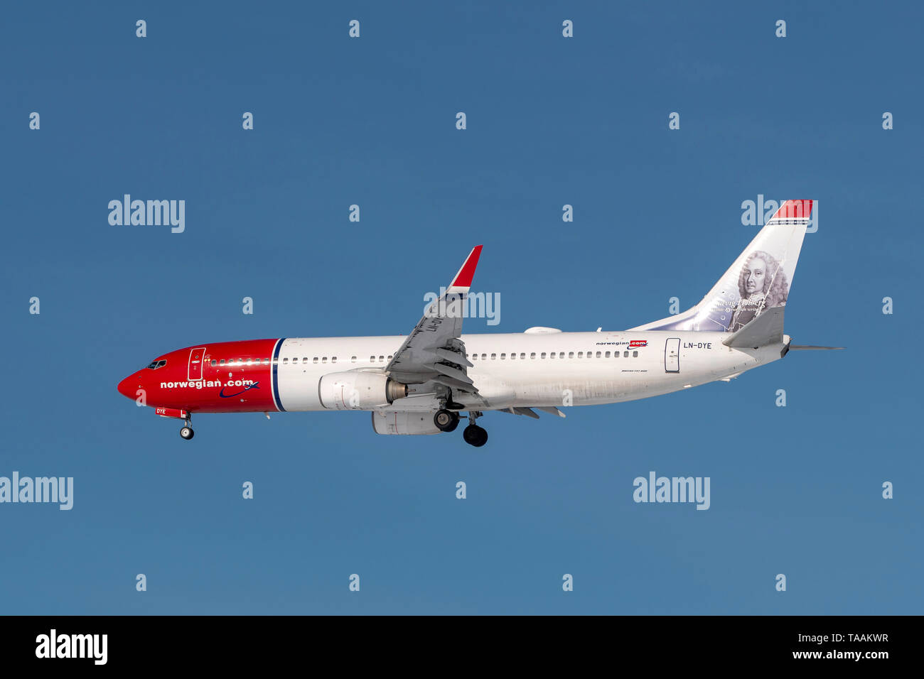 Munich, Germany - 08. February 2019 : Norwegian Boeing 737-8JP with the aircraft registration LN-DYE in the approach to the northern runway of the Mun Stock Photo