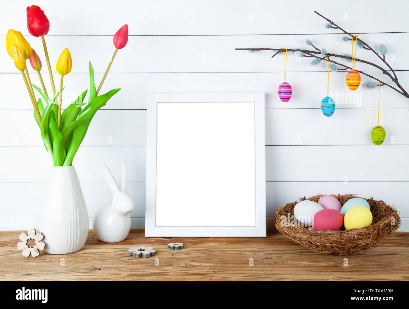Easter interior decoration background with easter eggs and easter bunny Stock Photo