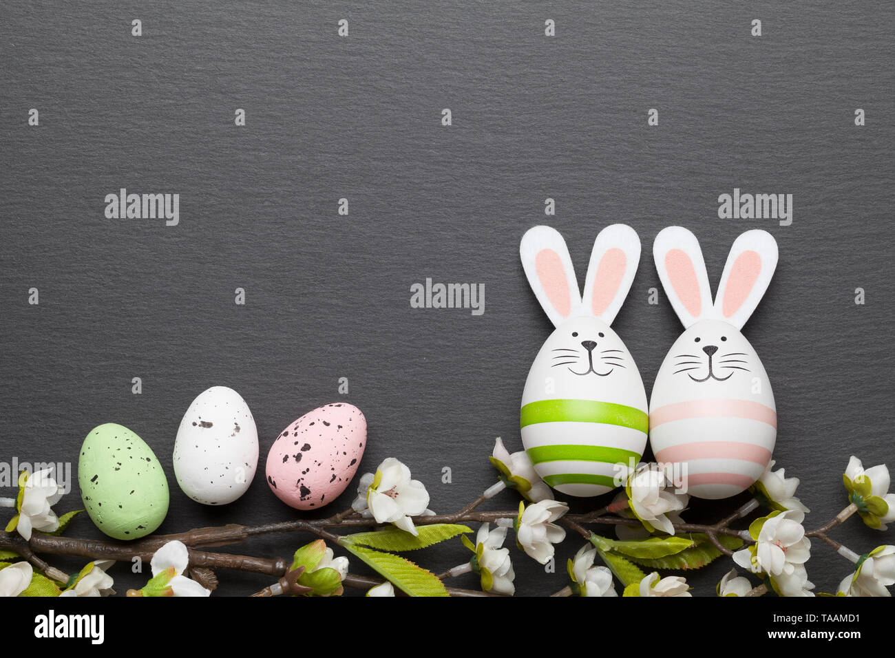 Easter background with easter bunnies and easter eggs Stock Photo