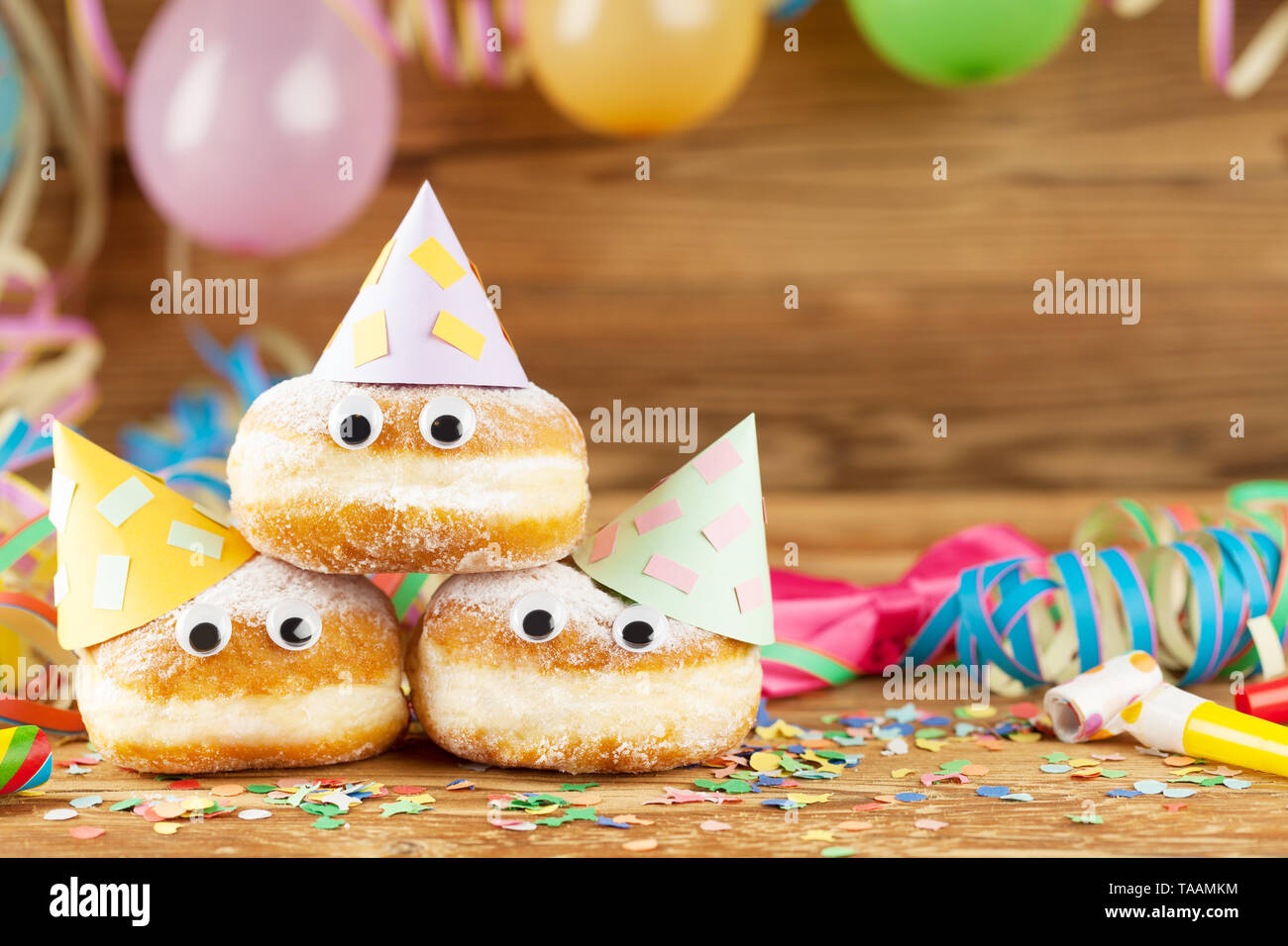 Carnival background with party decoration and cake Stock Photo