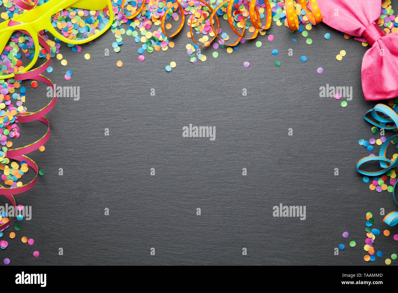 Party background with confetti and streamers Stock Photo