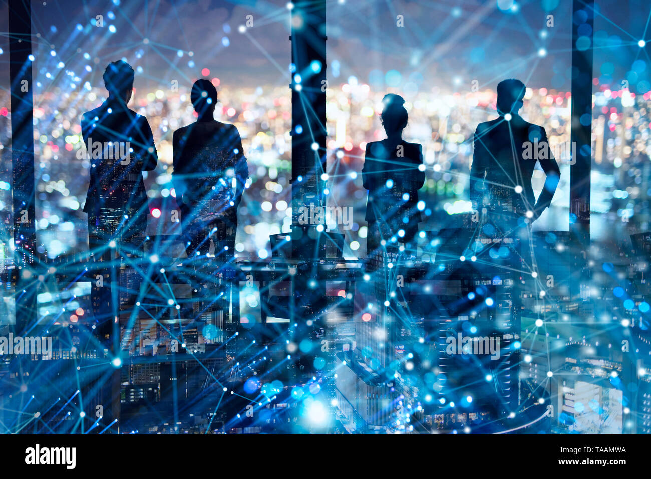Group of business partner looking for the future with network digital effect Stock Photo