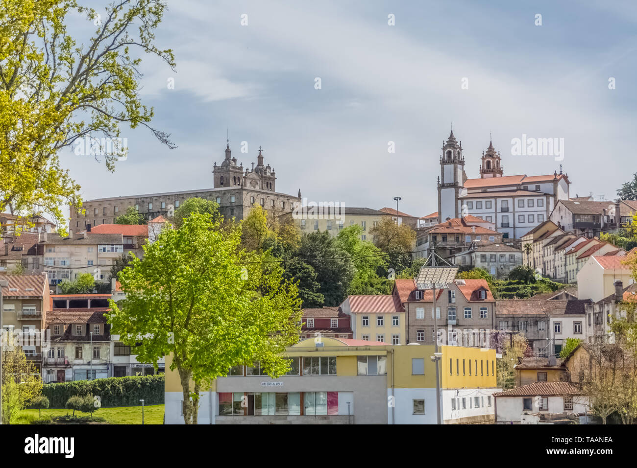 Viseu / Portugal - 04 16 2019 : View at the Viseu city, with Cathedral of Viseu and Church of Mercy on top, Sé Cathedral de Viseu e Igreja da Miserico Stock Photo