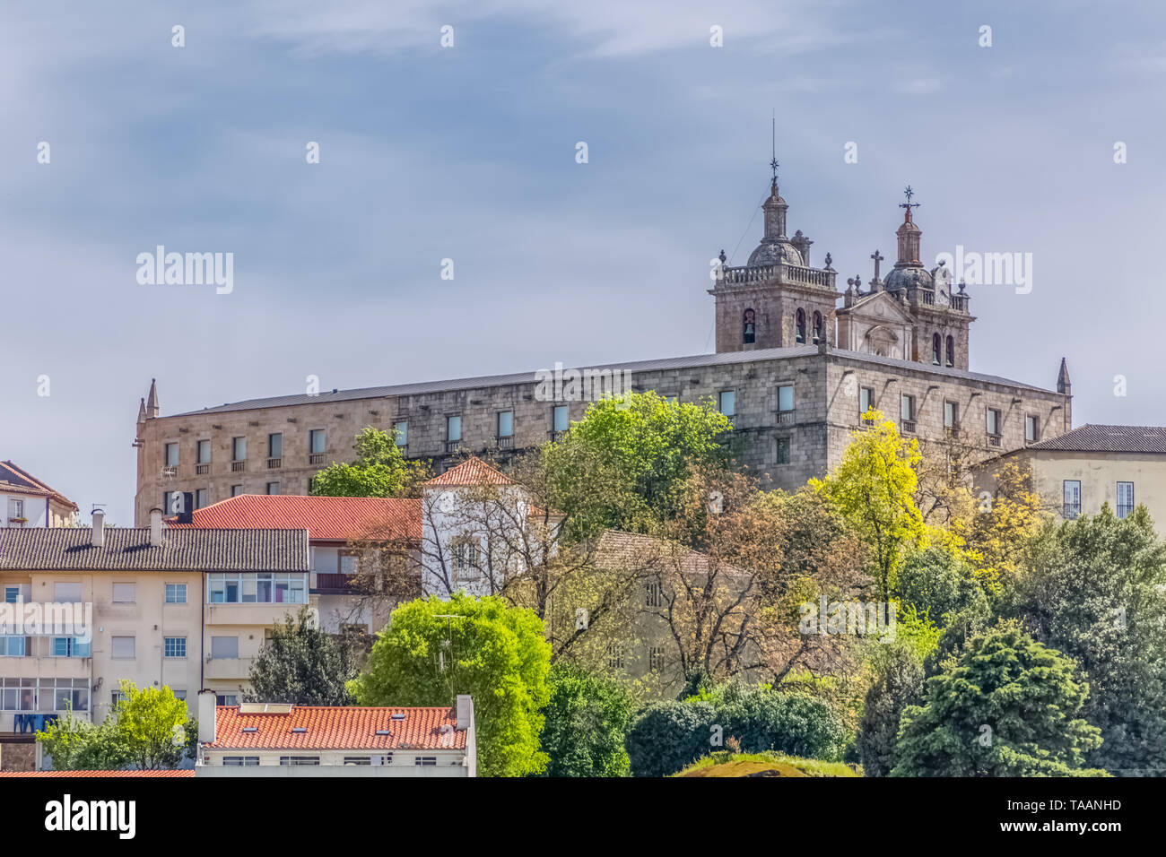 Viseu / Portugal - 04 16 2019 : View at the Viseu city, with Cathedral of Viseu on top, Sé Cathedral de Viseu, historical monument with various classi Stock Photo