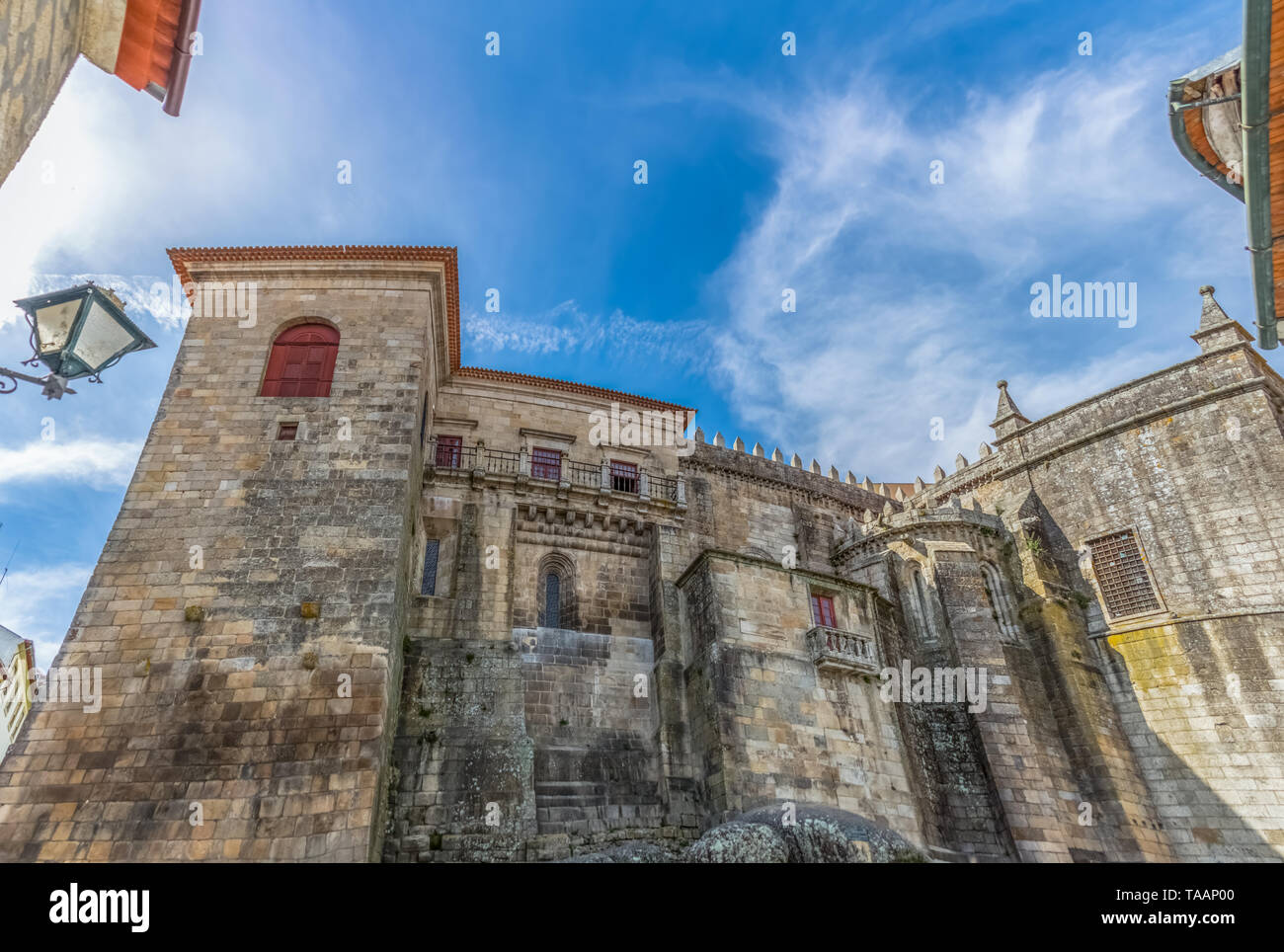 Viseu / Portugal - 04 16 2019 : Detailed view at the back facade of the Cathedral of Viseu, Sé Cathedral de Viseu, architectural icon of the city of V Stock Photo