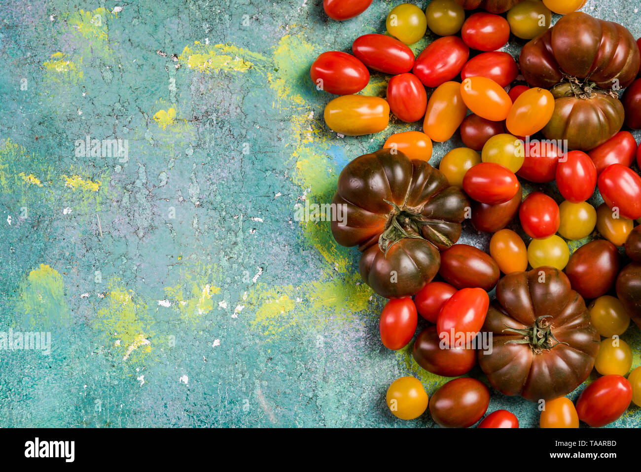 Market fresh raw colorful tomatoes. Stock Photo