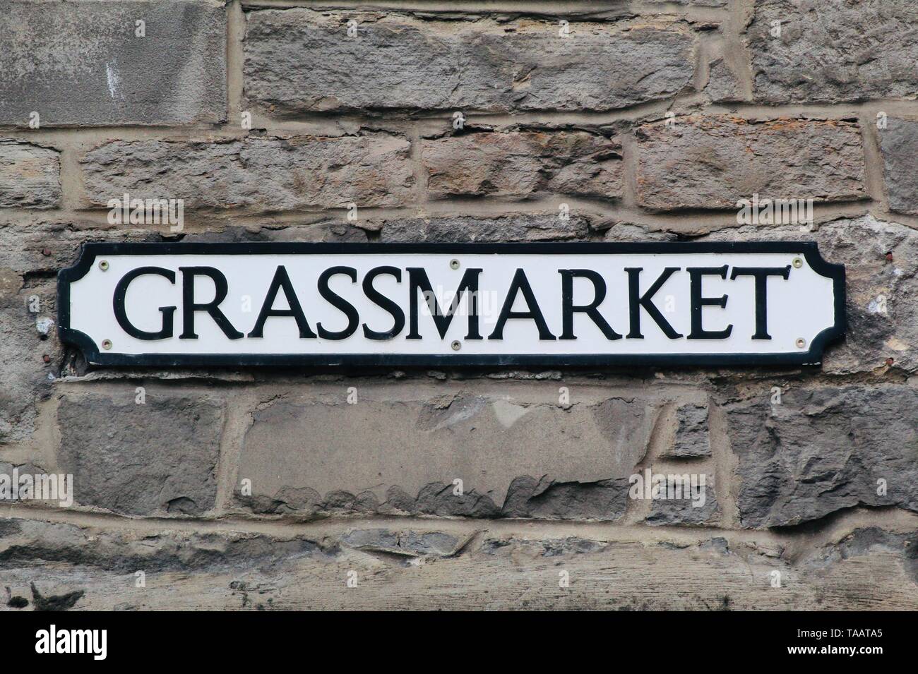 Traditional street name sign for the Grassmarket in Edinburgh Scotland