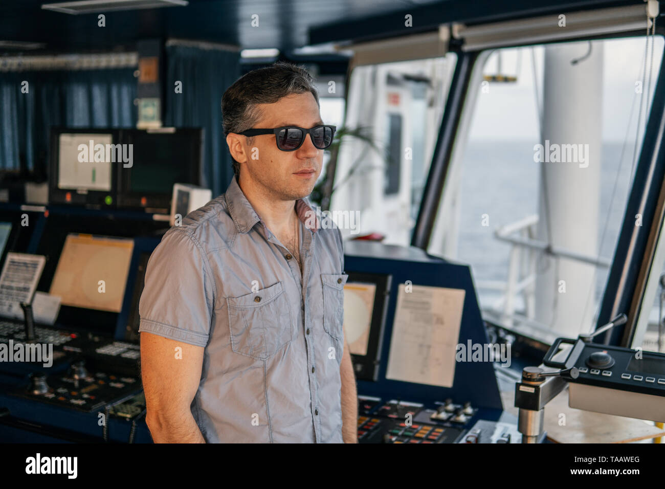 Marine navigational officer or chief mate on navigation watch Stock Photo