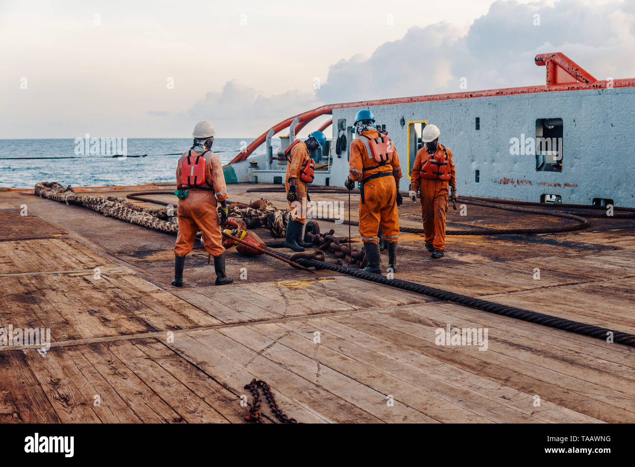 Vessel crew preparing vessel for static tow tanker lifting Stock Photo