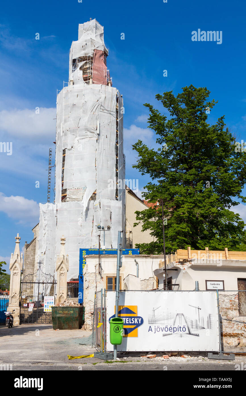 Medieval church steeple in scaffolding during renovation, Szent Mihaly templom, Sopron, Hungary Stock Photo