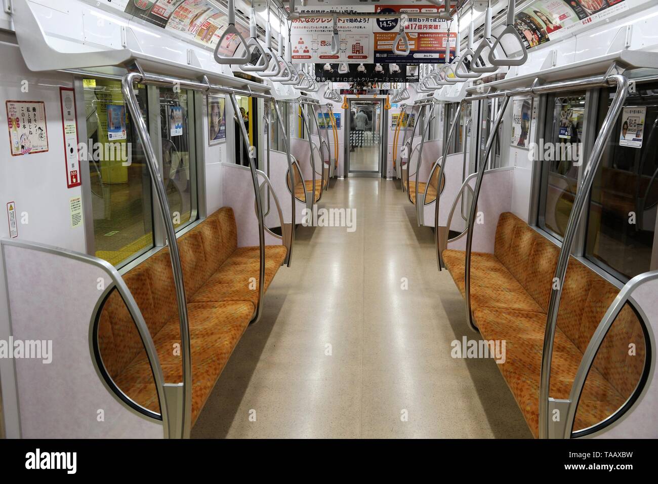 TOKYO, JAPAN - NOVEMBER 30, 2016: Empty metro train in Tokyo. With more than 3.1 billion annual passenger rides, Tokyo subway system is the busiest wo Stock Photo