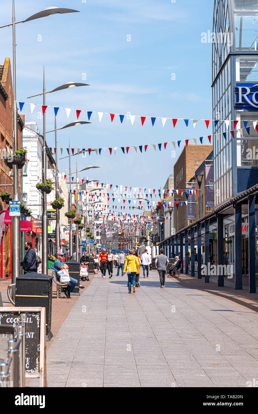 Southend on Sea, Essex, UK. High Street with people on a sunny day. Shoppers. Shops. Bunting. Pedestrianised precinct Stock Photo