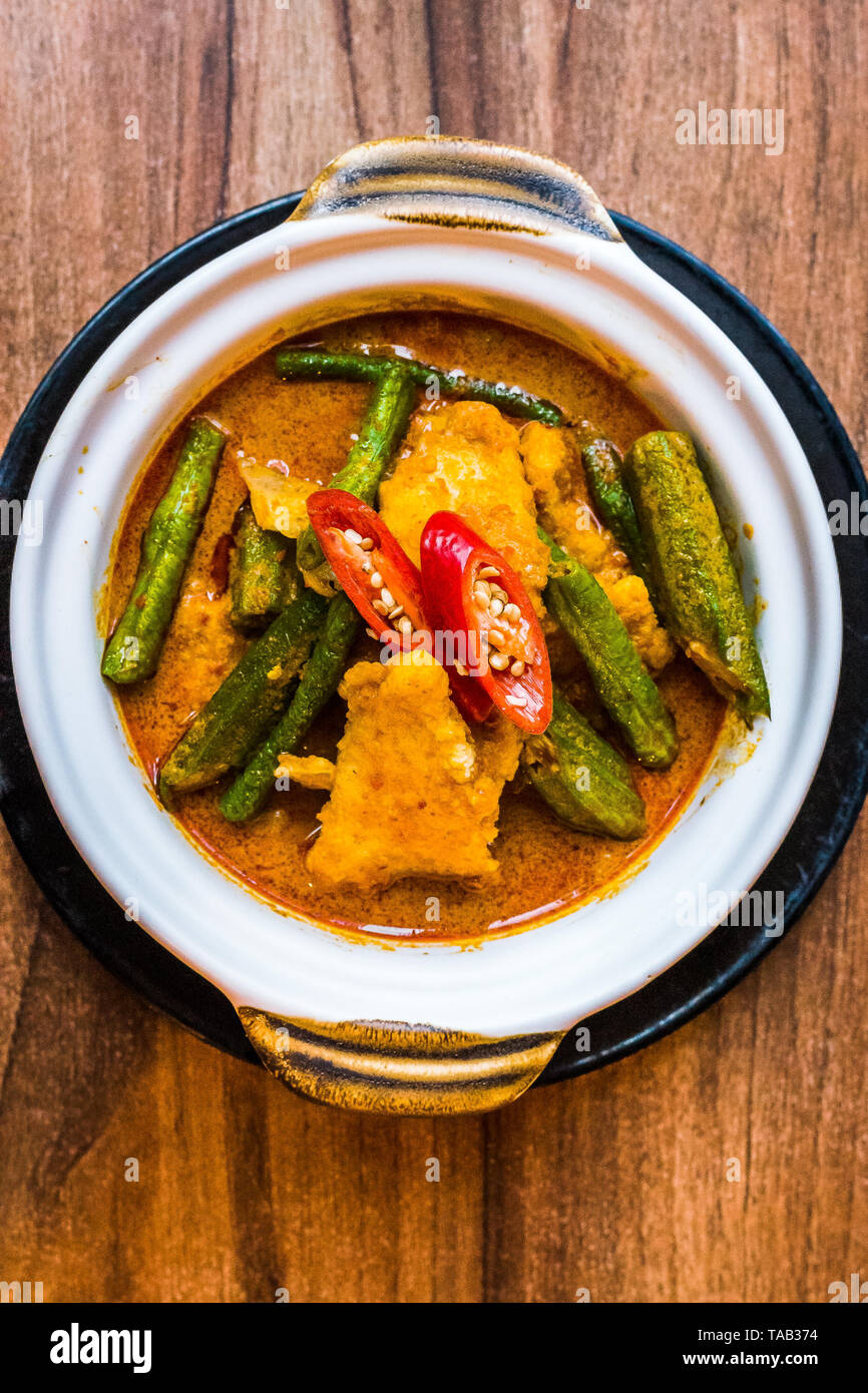 Mild fish curry with chilli, lady's fingers, okra, long beans, snap