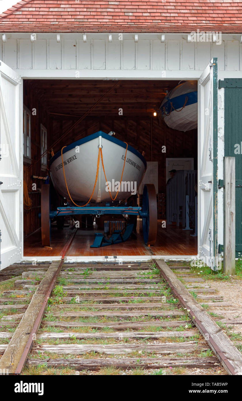 Maritime Museum; U.S. Life Saving equipment display; rescue boat, outdoor wood track, Sleeping Bear Dunes National Lakeshore; Michigan; Glen Haven; MI Stock Photo