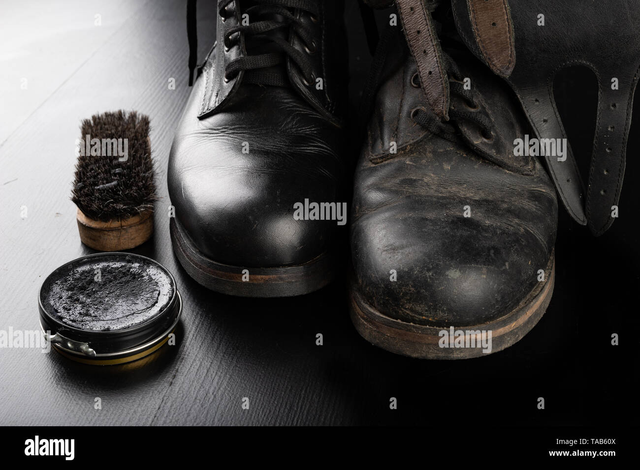 polishing black boots