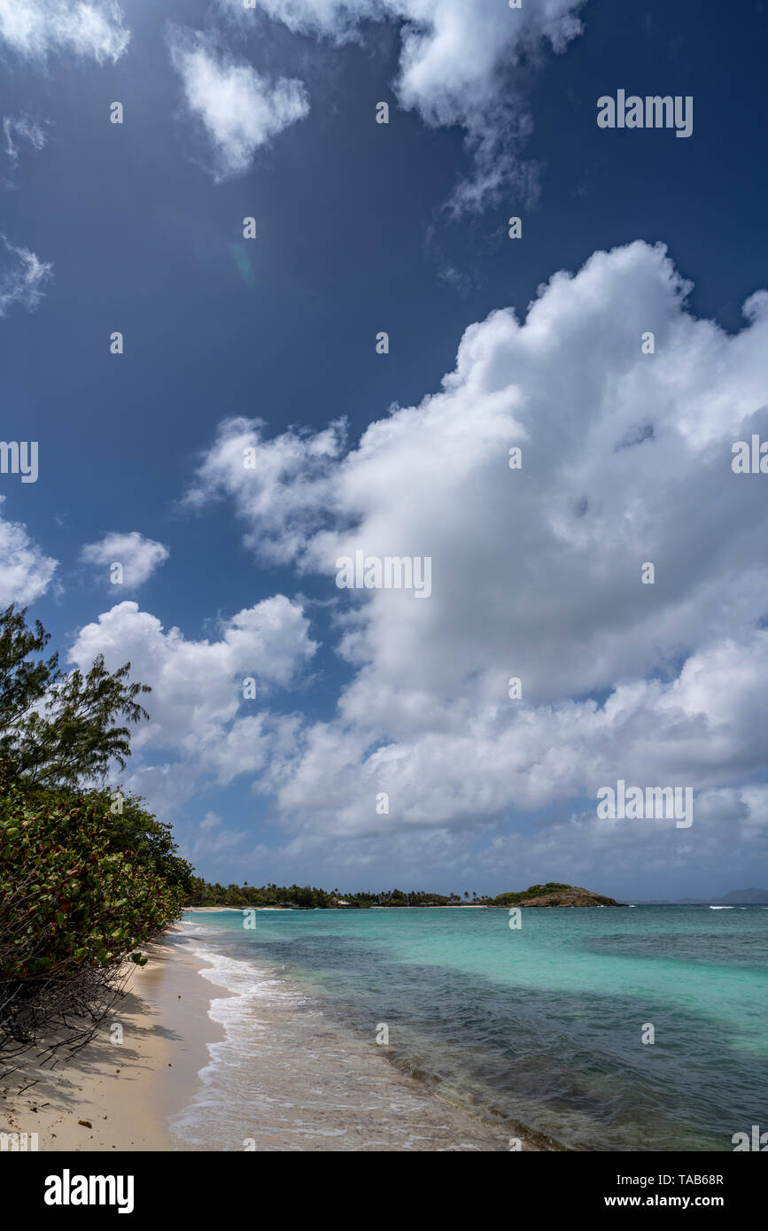 Mustique Island is an exclusive, paradise, getaway and Caribbean destination with a beautiful fishing village and white sand beaches. Private Island. Stock Photo