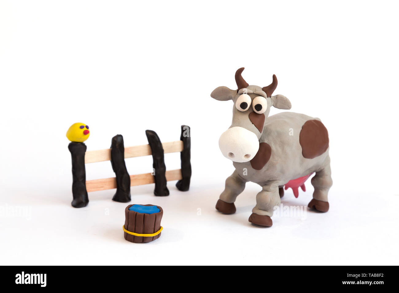 Handmade plasticine clay cow farm Stock Photo