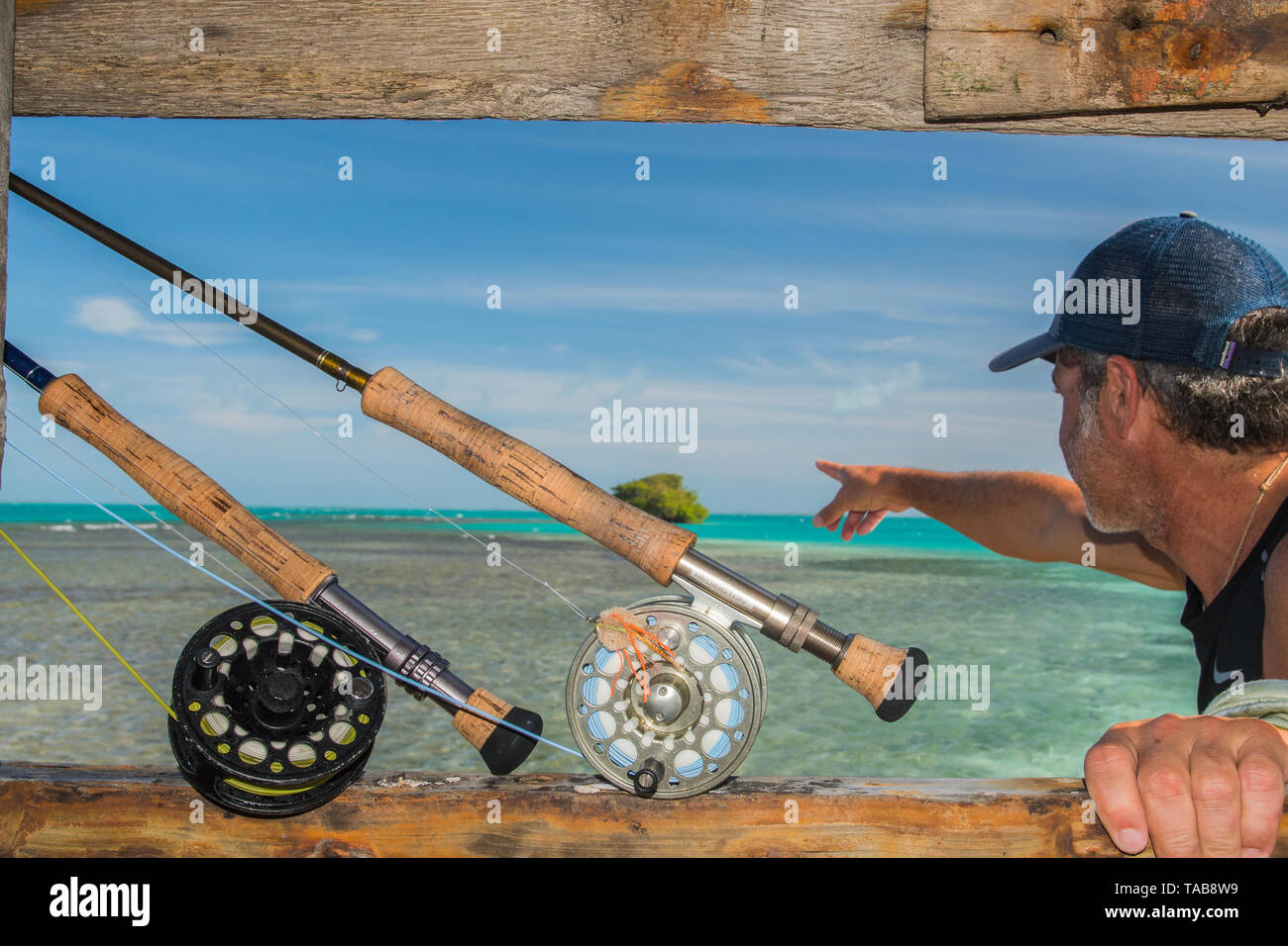 Fisherman with sport fishing gear in tropical mangrove. Los Roques  Archipelago Venezuela Stock Photo - Alamy