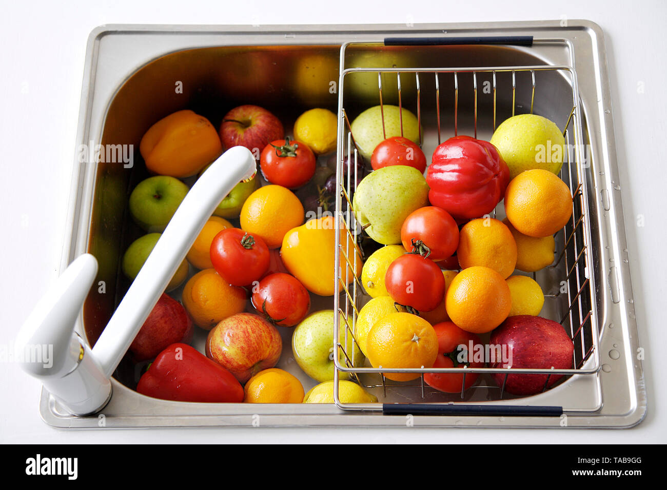 fruits in washed containers Stock Photo Alamy