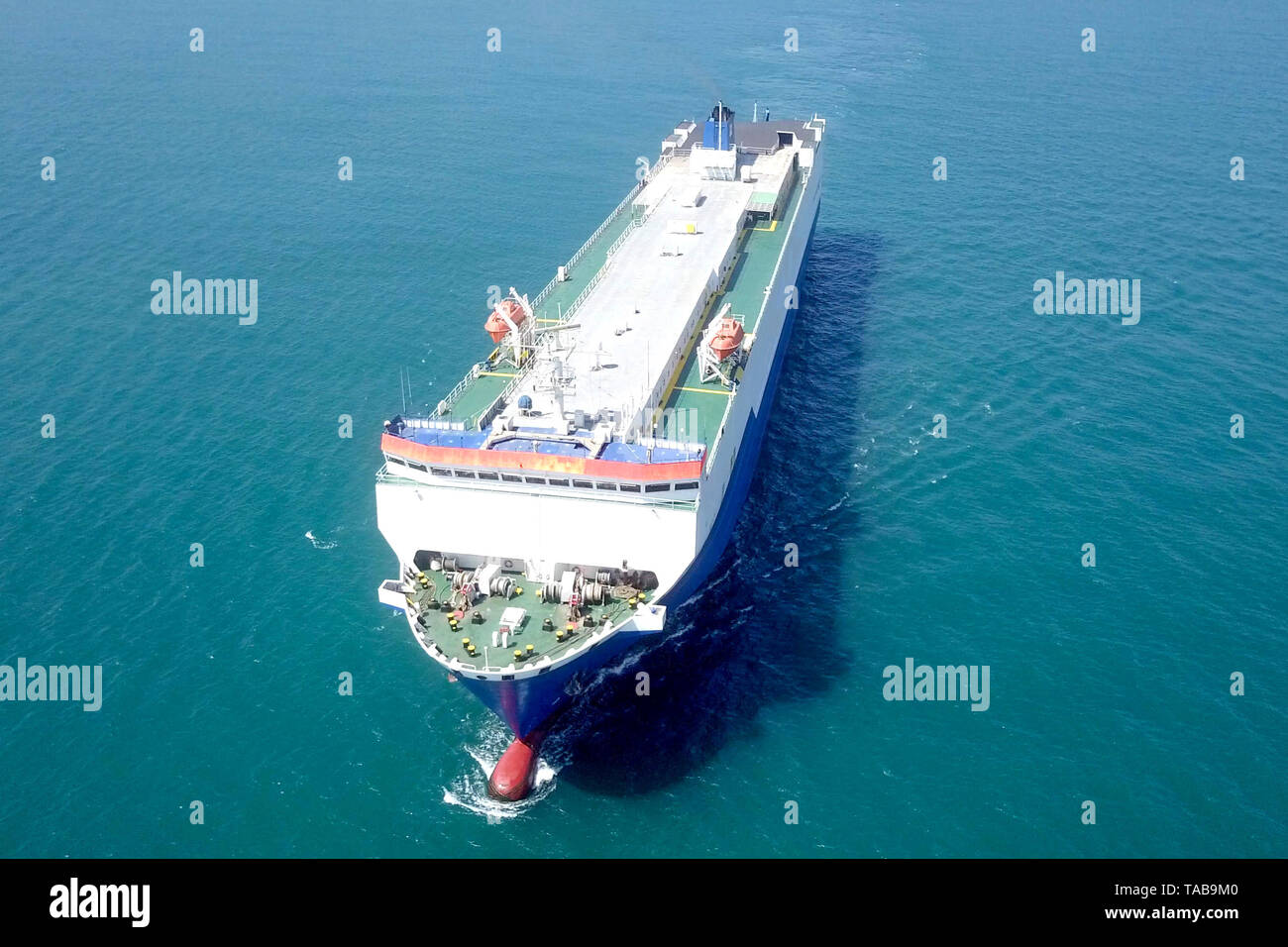 Aerial image of a Large RoRo (Roll on/off) Vehicle carrier vessel cruising the Mediterranean sea Stock Photo