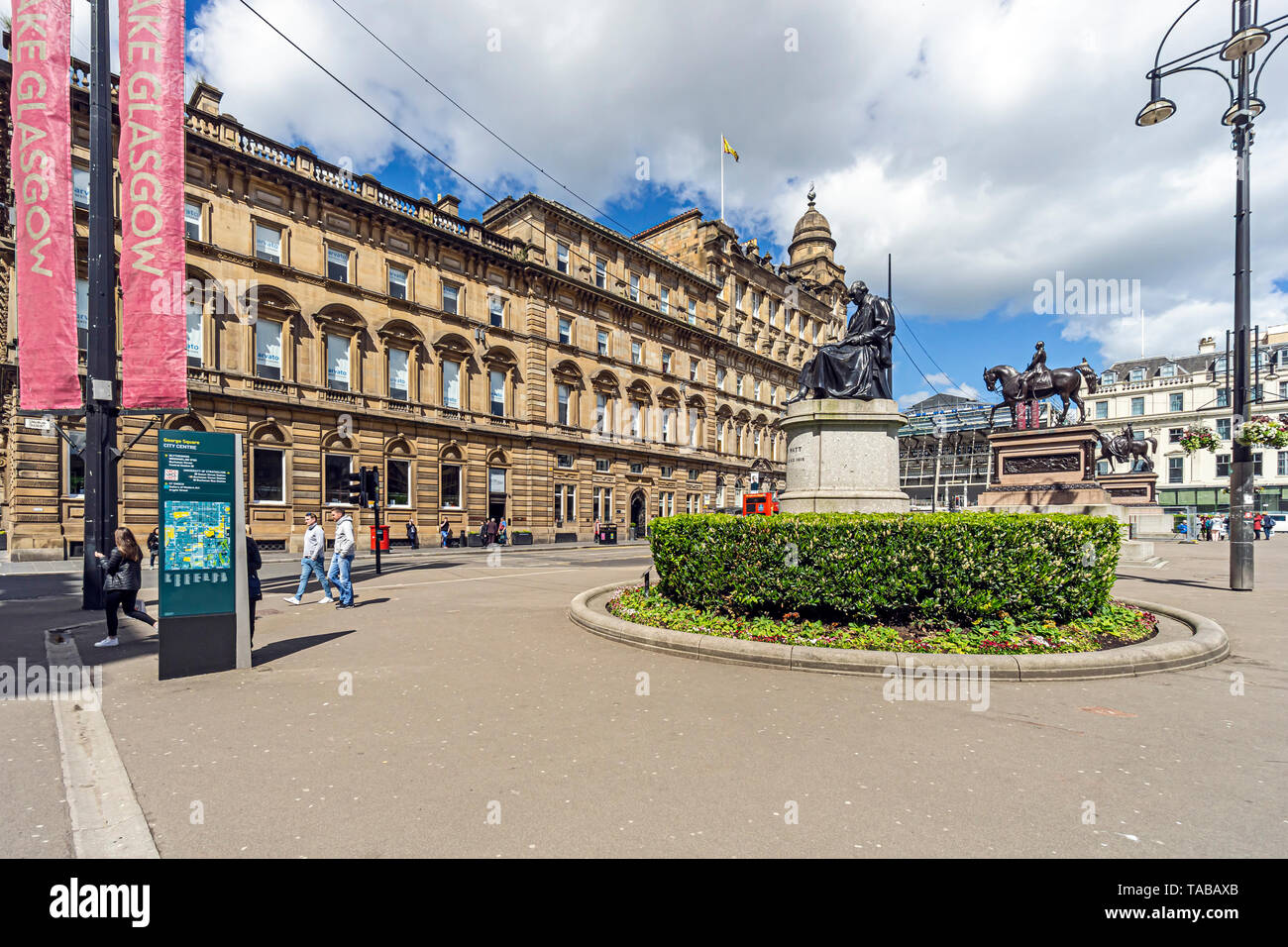 Monument to James Watt in George Square Glasgow Scotland UK with equestrian monuments to Prince Albert and Queen Victoria behind Stock Photo