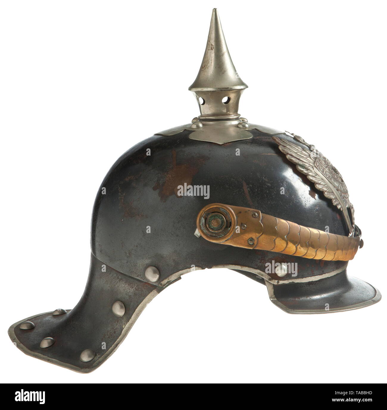 An Imperial German helmet M 1905 for enlisted men of mounted rifles 1-4 regiments Metal lobster tail body with blued finish showing some rust and pitting, body dated '1914' and maker marked, black leather lining, bright silver dragoon eagle front plate attached by loops with leather straps, silver spike, cross base and body trim, large rounded brass chinstraps and 91 lugs, extra mounting holes in body behind 91 lugs, missing cockades. USA-lot, see page 4. historic, historical, Prussian, Prussia, German, Germany, militaria, military, object, objec, Additional-Rights-Clearance-Info-Not-Available Stock Photo