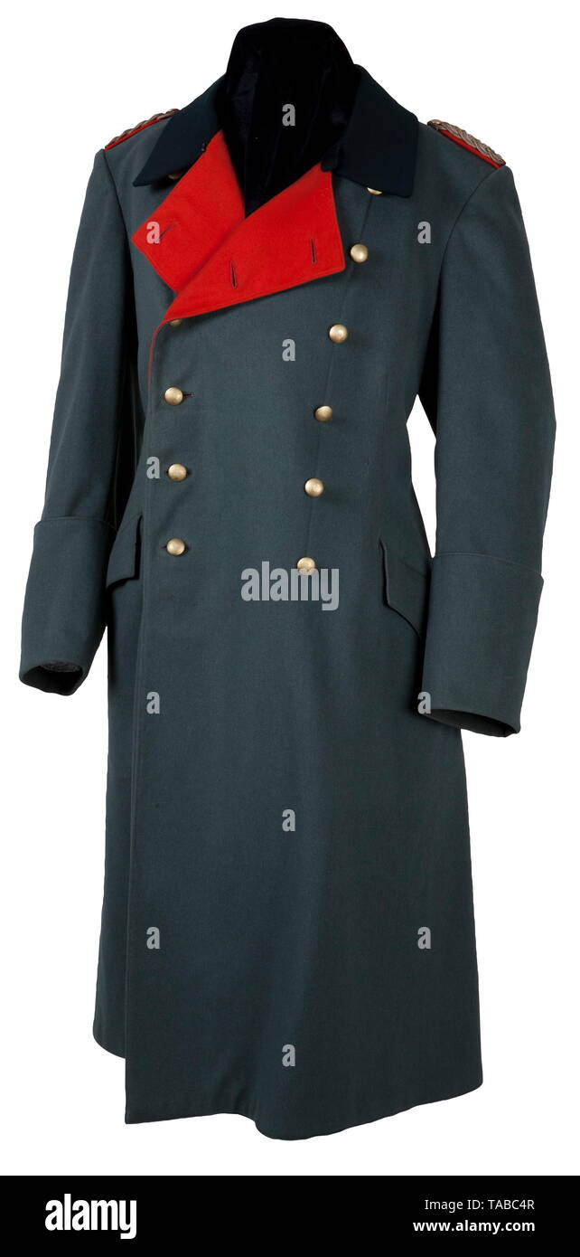 An army general's overcoat Fine field-grey doeskin, graphite-grey satin lining, dark-green collar, red lapels, double row of six gilt pebbled buttons, two scalloped side pockets, sewn in gold and silver bullion shoulder boards with red underlay. Good condition. USA-lot, see page 4. historic, historical, army, armies, armed forces, military, militaria, 20th century, Editorial-Use-Only Stock Photo