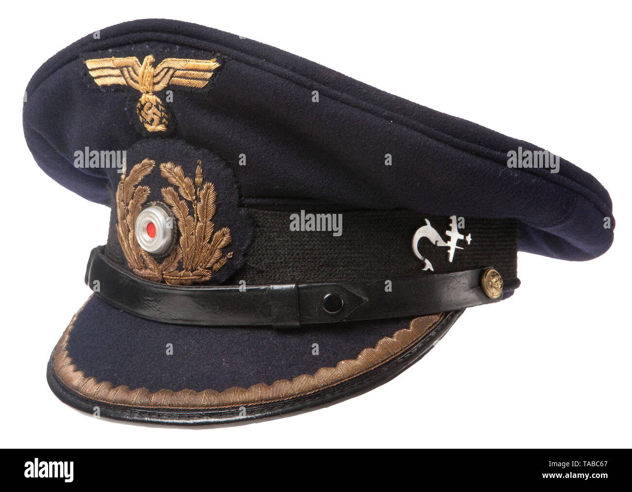 A named Kriegsmarine visor cap for Kapitänleutnant Götz von Hartmann Fine  blue doeskin top with a horizontally ribbed black mohair centre band, gold  bullion embroidered insignia with aluminium cockade, black vulcan fiber
