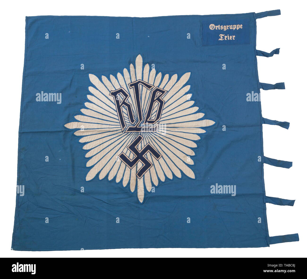 An RLB unit flag, 1st pattern Double-sided, multi-piece, blue cotton construction. Navy blue cotton 'RLB' and swastika superimposed over chain stitched applied woven silver flat wire starburst rays mounted. Blue wool corner panel with white chain stitched 'Ortsgruppe Trier'. Seven cloth attachment straps. Small holes and light staining. Approximately 120 x 120 cm. USA-lot, see page 4. historic, historical, Reichsluftschutzbund, State Air Protection Corps, organisation, organization, organizations, organisations, NS, National Socialism, Nazism, Third Reich, German Reich, Ger, Editorial-Use-Only Stock Photo