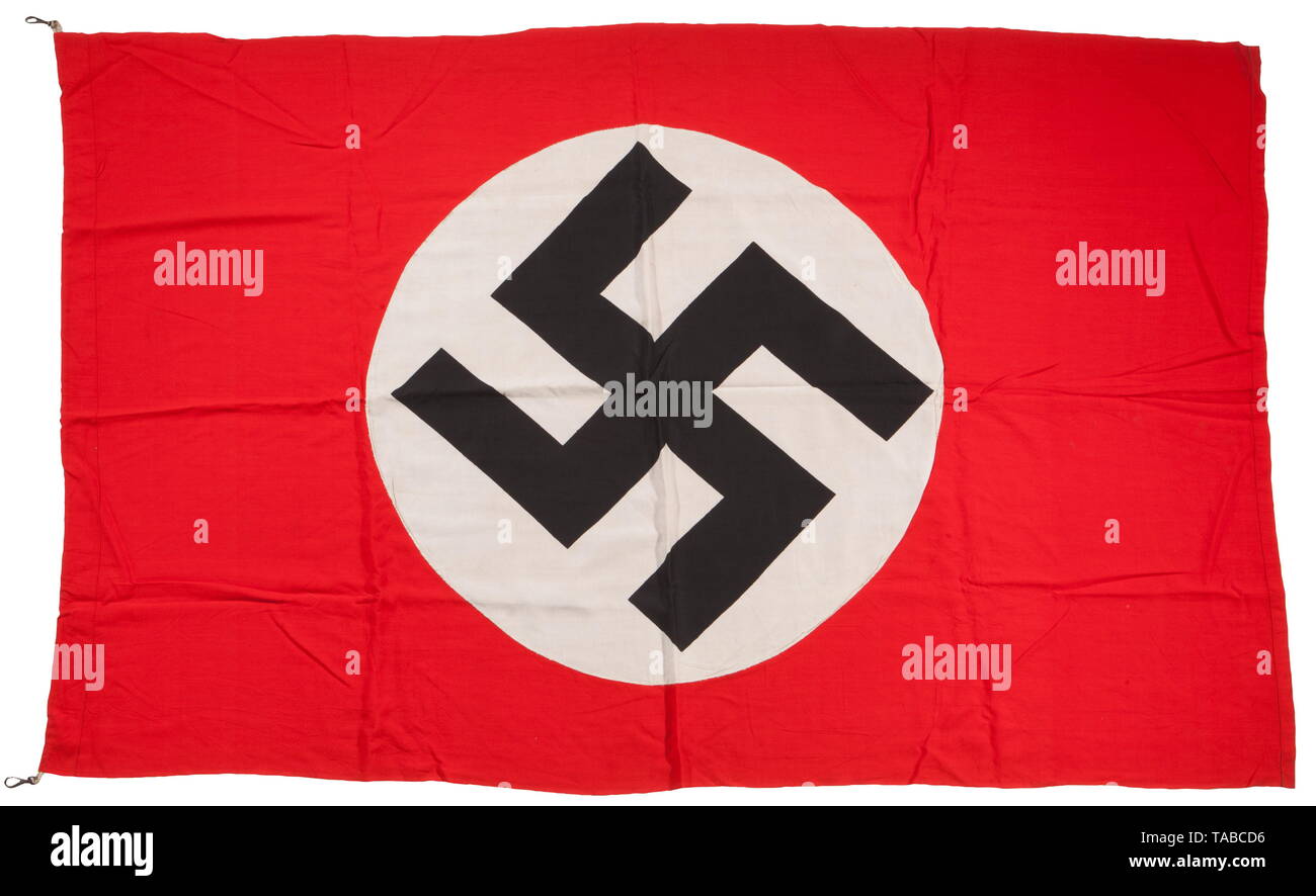 An NSDAP flag Double-sided, multi-piece, red cotton construction. Applied separate black swastika and white circular field. Hoist edge with two lanyard attached clips. Approximately 140 x 90 cm. USA-lot, see page 4. historic, historical, 20th century, 1930s, party organisation, party organization, organisations, organizations, organization, organisation, party, parties, political party, German, Germany, NS, National Socialism, Nazism, Third Reich, German Reich, utensil, piece of equipment, utensils, object, objects, stills, Editorial-Use-Only Stock Photo
