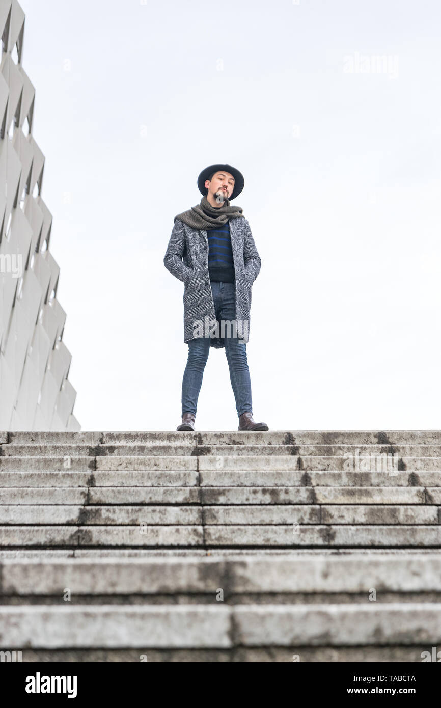 Powerful Dark Haired Woman Standing Power Pose Long Apricot Dress Stock  Photo by ©njevtic 548991660