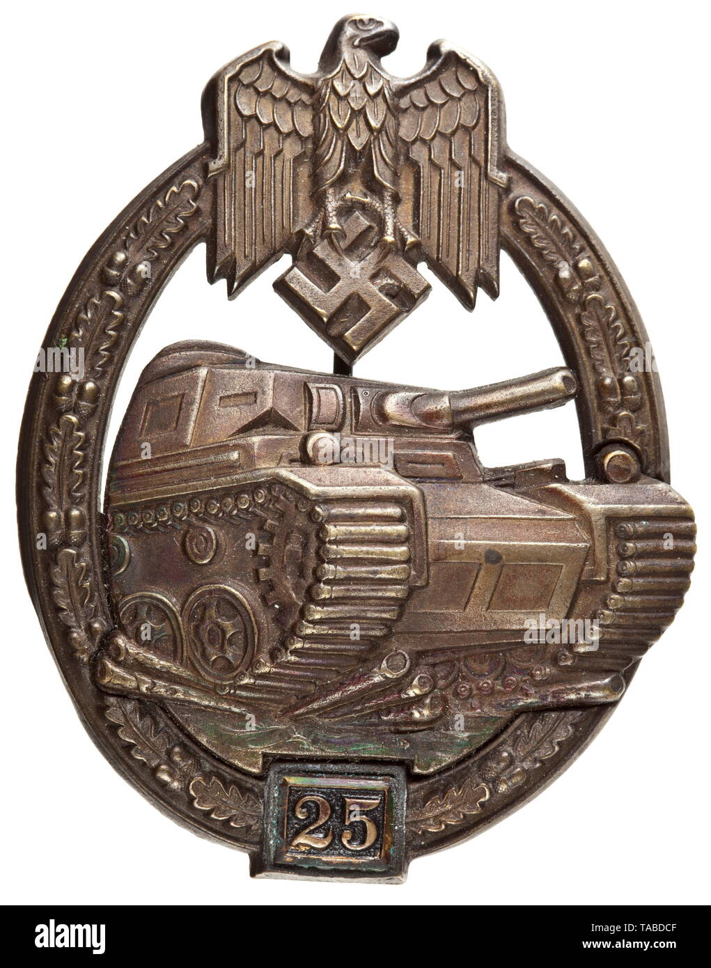 A Panzer Assault Badge in Bronze 2nd class for 25 engagements The semi-hollow, early issue of the bronzed badge in zinc produced by the manufacturer Gustav Brehmer in Markneukirchen. The tank riveted onto the oak leaf wreath with two hollow rivets. Also riveted the non-magnetic plate of gilt copper sheet painted black that is characteristic of Brehmer, displaying the number of assaults. The manufacturer's initials 'G.B.' embossed on the back of the tank, slim, magnetic wire pin. Hardly worn, this classic badge is in mint condition. Particularly when displaying the number of, Editorial-Use-Only Stock Photo