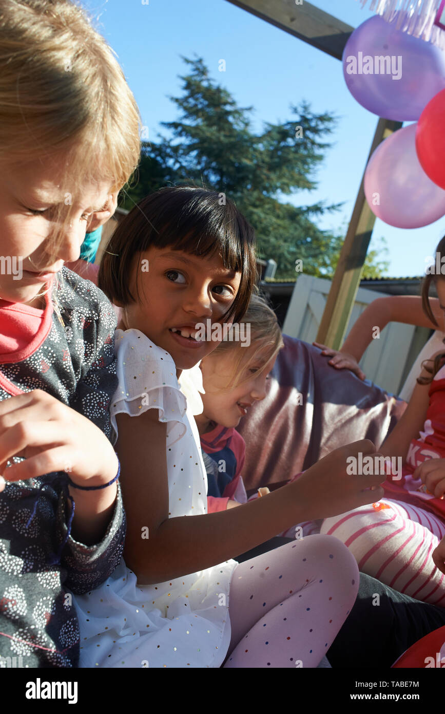 Hugging A Lod Kids hugging each other in white dress hi-res stock photography and ...