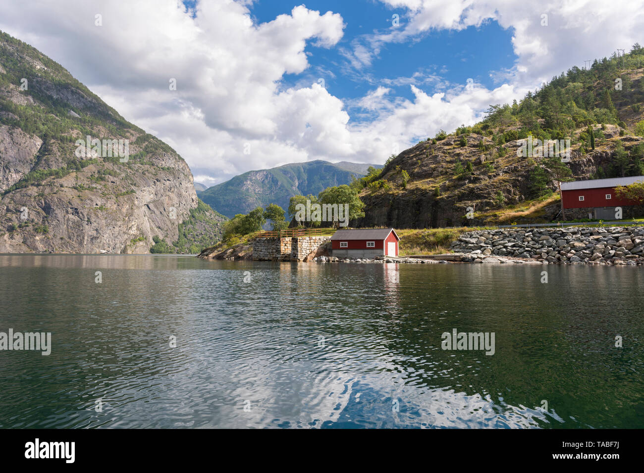 by boat between mountains on the Sognefjord in Laerdal, Norway Stock Photo