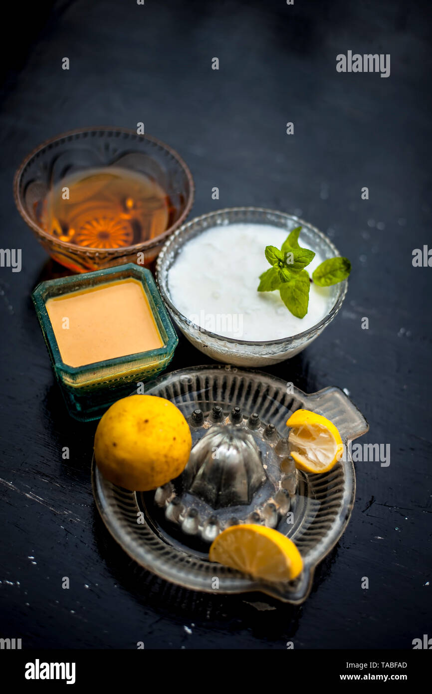Yogurt Face Pack With Raw Lemon Juice Honey And Turmeric Powder And Yogurt Or Curd In A Glass Bowl On Wooden Surface Close Up View For Acne Prone Ski Stock Photo Alamy