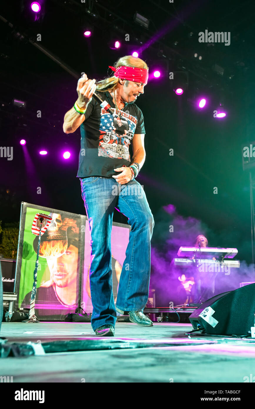Indio, California, April 26, 2019, Bret Michaels Band on stage performing to an energetic crowd on day 1 of the Stagecoach Country Music Festival. Stock Photo
