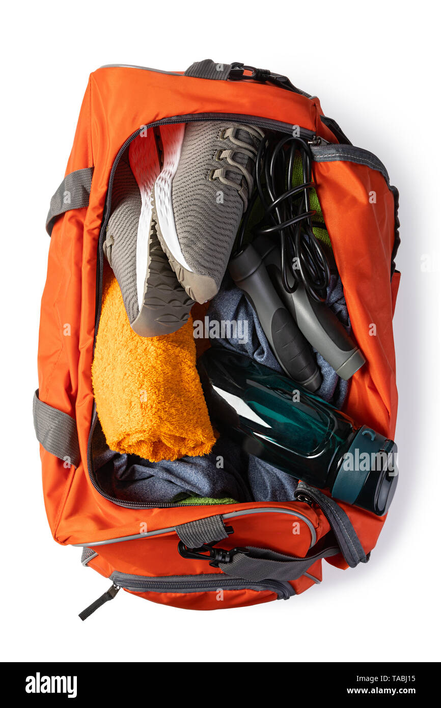 Sports bag with sports equipment Isolated on white background Stock Photo