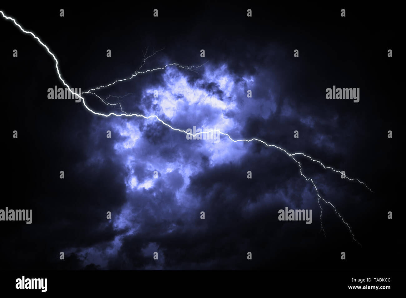 Lightning strike on the dark cloudy sky Stock Photo - Alamy