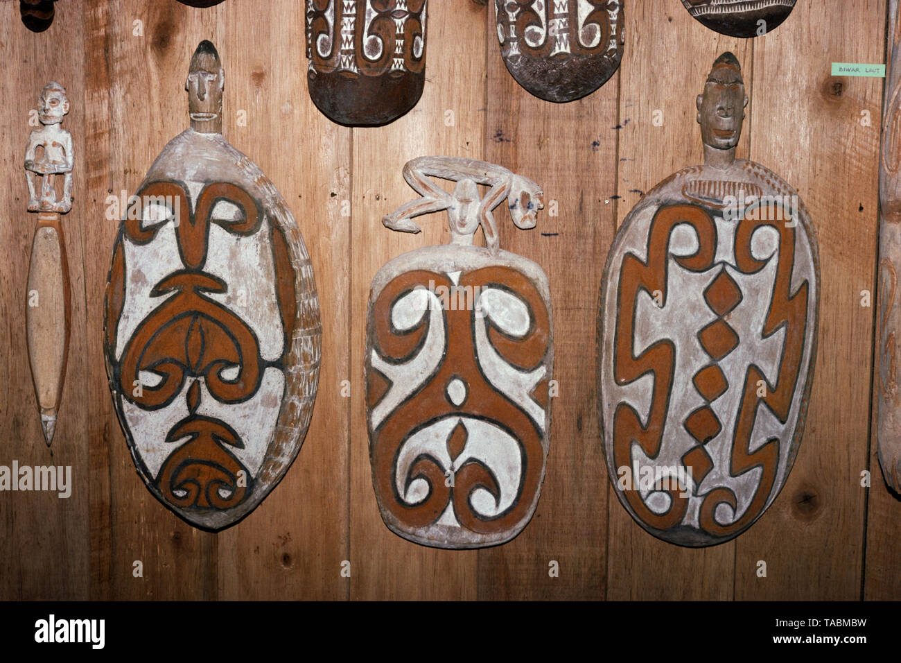 Asmat people: ethnic group living in the Papua province of Indonesia, along the Arafura Sea.  Asmat carvings from the village of Bewar Laut, at the As Stock Photo