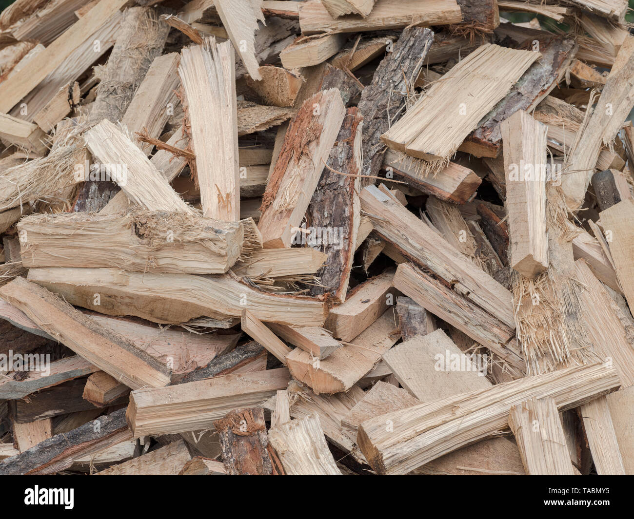 split wood for cooking / burning. Firewood pile Stock Photo Alamy