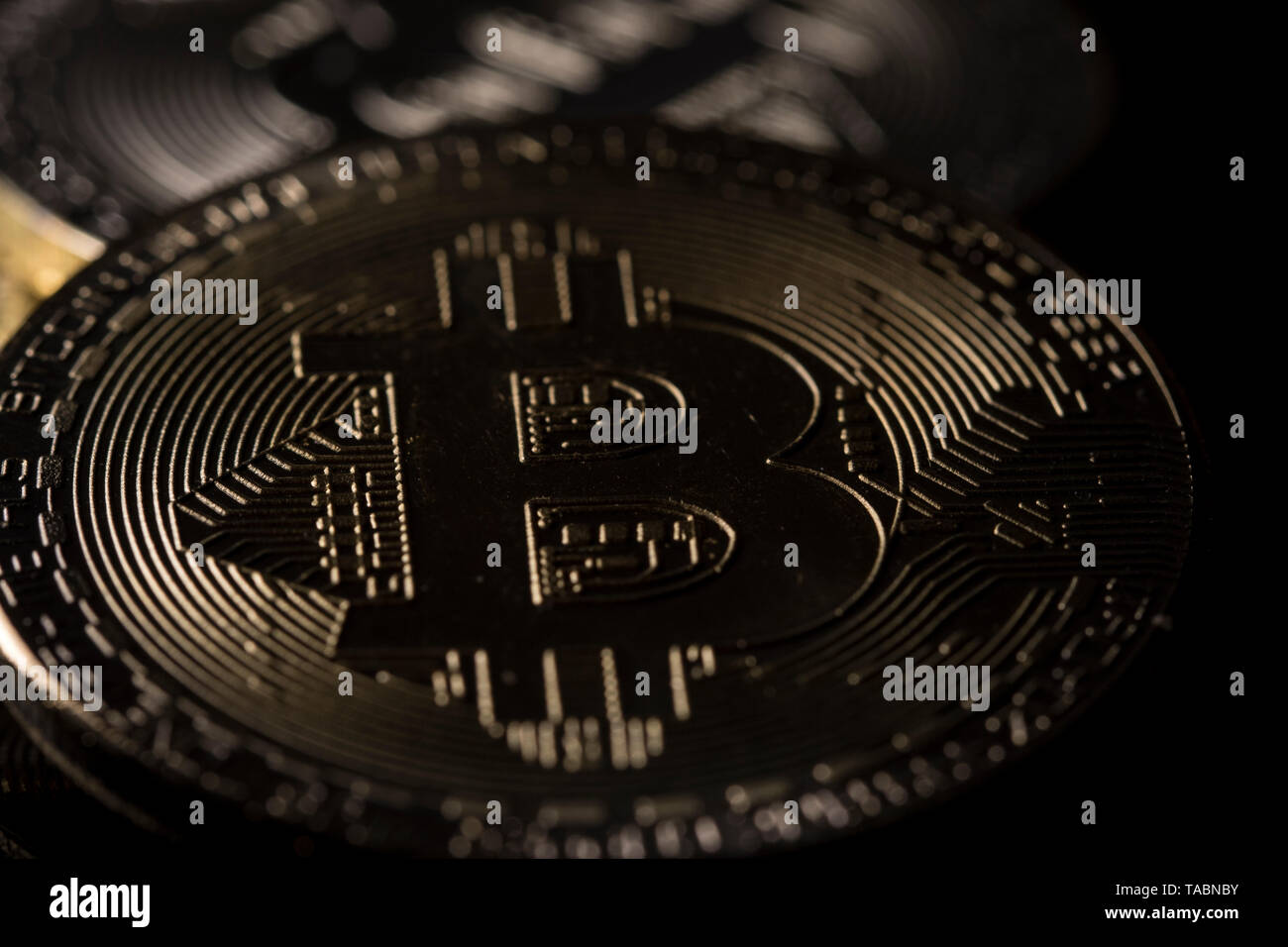 Bitcoin cryptocurrency gold coin. Trading on the cryptocurrency exchange.  Trends in bitcoin exchange rates. Rise and fall charts of bitcoin Stock  Photo - Alamy