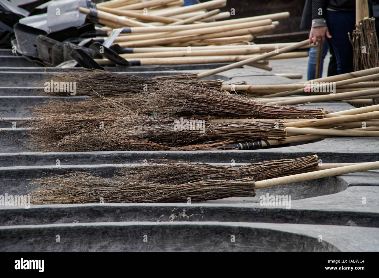 Brooms and shovels for cleaning the urban area during the work day