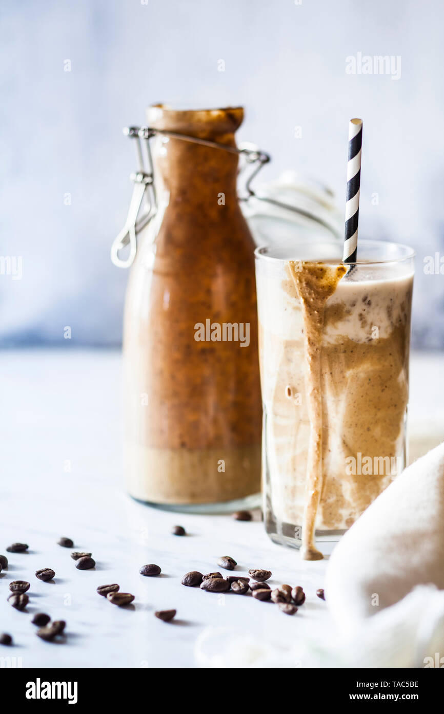Sugarfree wake-up smoothie with banana, jogurt, coffee and linseeds Stock Photo