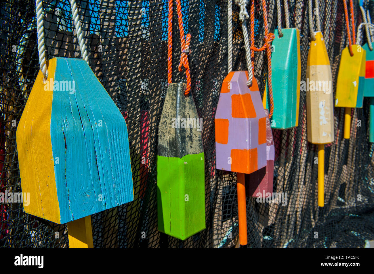 USA, Maine, Colourful surface marker buoys on restaurant, Bar Harbor, entrance gate to the Acadia National Park Stock Photo